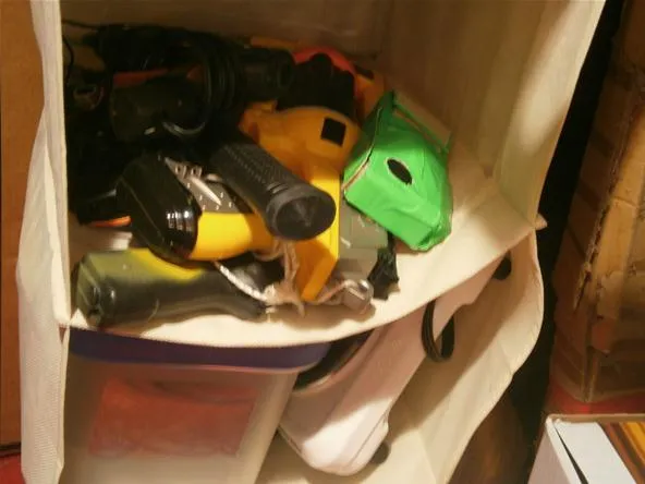Tools and equipment in storage containers.