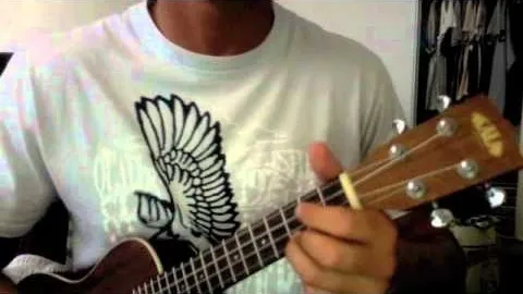 Person playing a ukulele.
