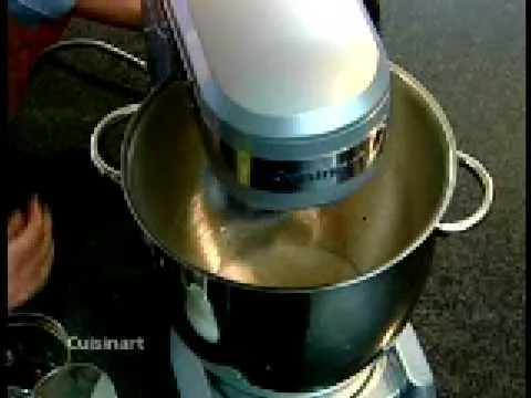 Stand mixer in use with mixing bowl.
