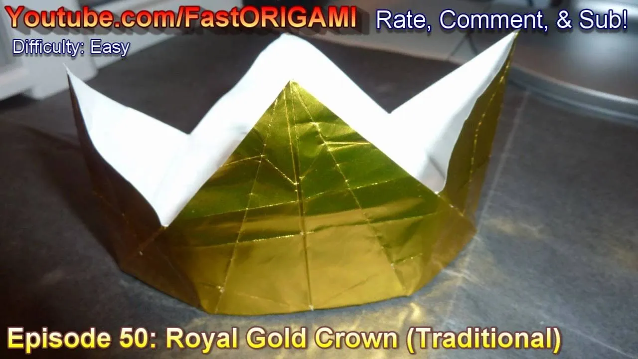 Gold origami crown with a traditional design.