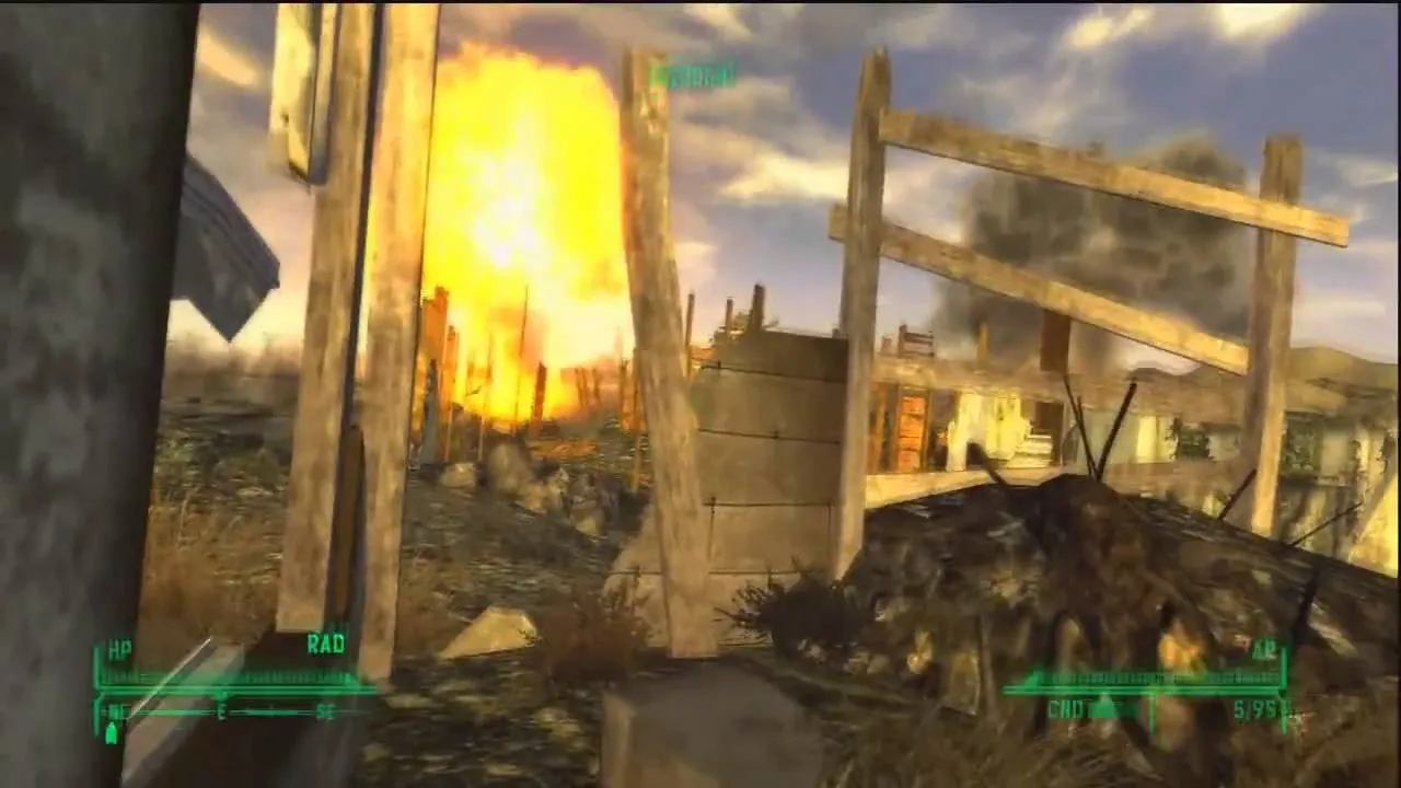A post-apocalyptic landscape with a distant explosion and debris.