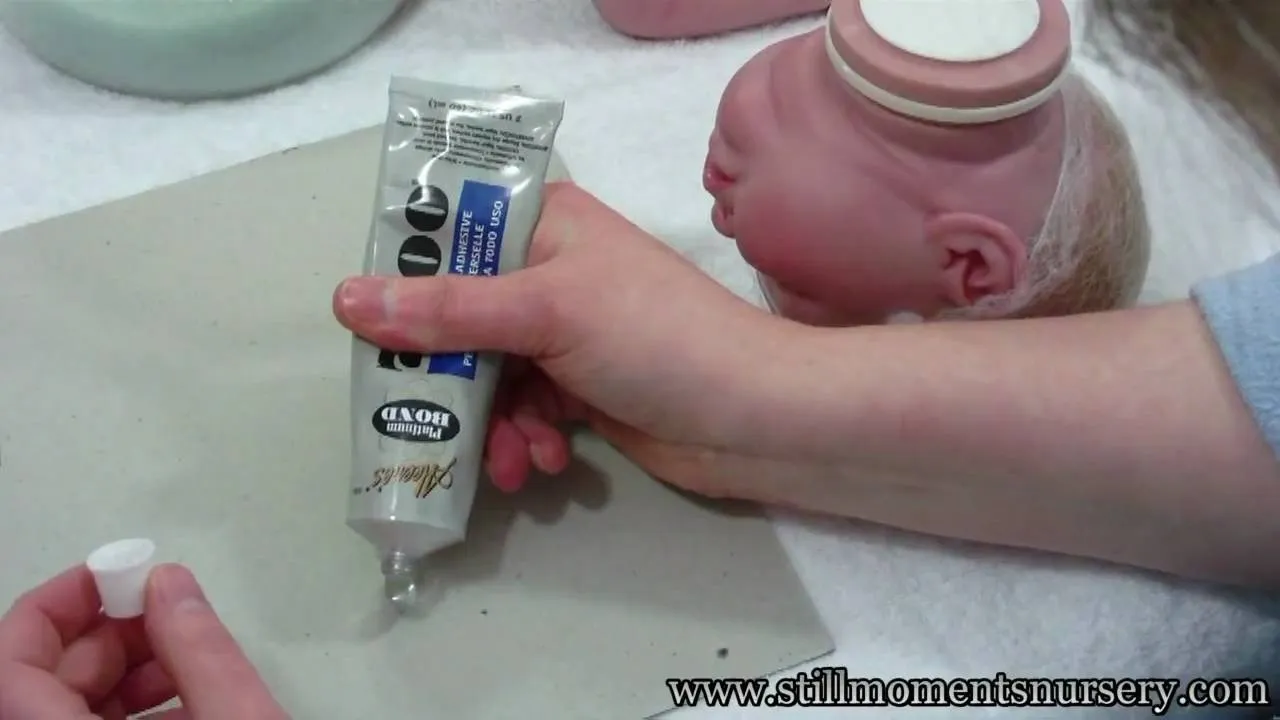 Artisan crafting process for doll making.