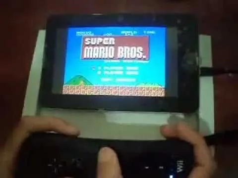 Super Mario Bros. game displayed on a handheld console.