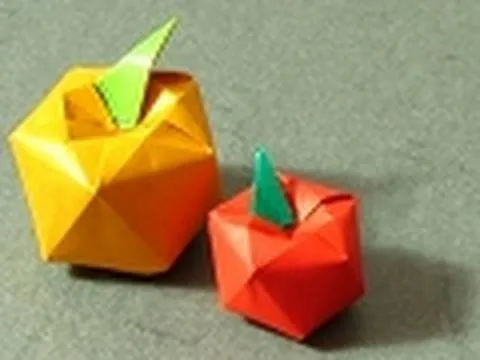 Origami apples and leaves in red and yellow.