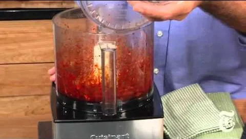 Cooking process with a food processor blending ingredients.