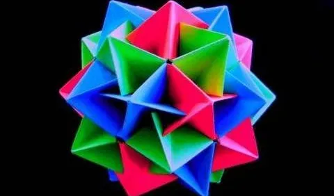 Colorful geometric polyhedron shape with triangular faces.