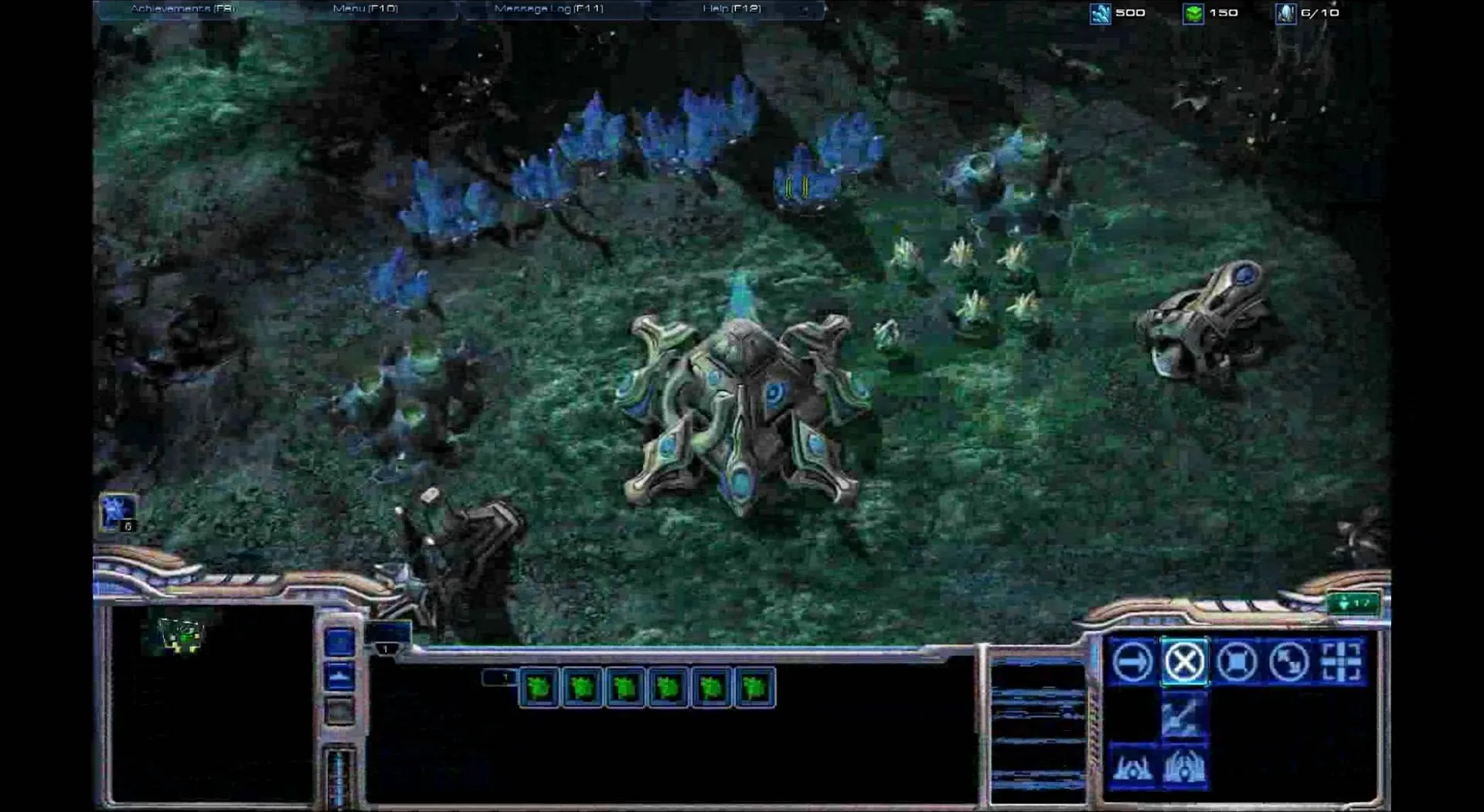 A scene from a sci-fi strategy game featuring alien structures and units.