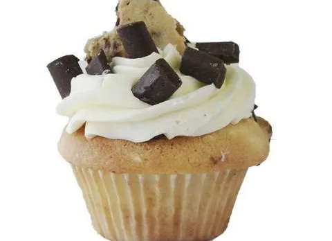 Chocolate chip cookie cupcake with cream frosting and chocolate chunks.