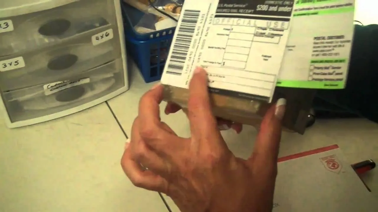 Label on a package being held in a person's hand.