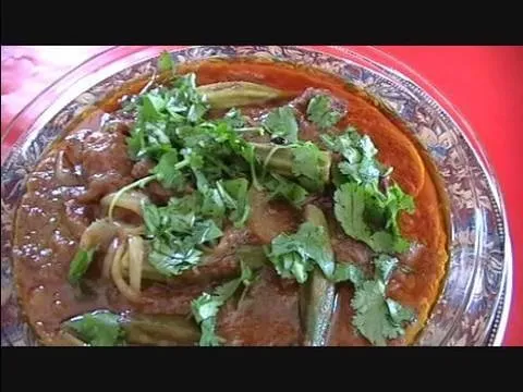 Delicious curry dish garnished with fresh cilantro.