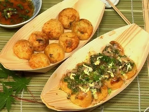 Japanese dango and takoyaki served on bamboo plates.