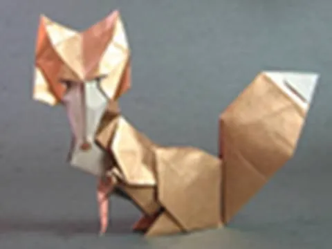 Origami fox made from folded paper.