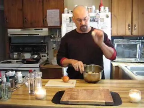 Man preparing food in a kitchen.