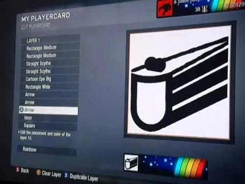 Gaming emblem design featuring a stylized black and white graphic.