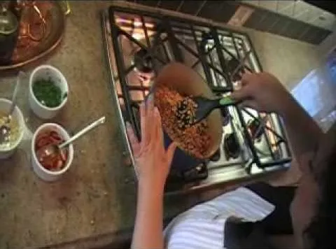Cooking lentils in a pot on the stove.