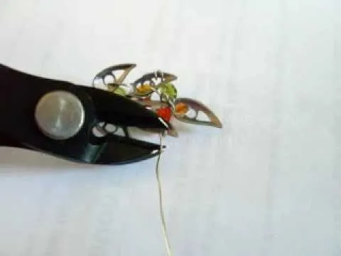 Wire cutting with pliers.