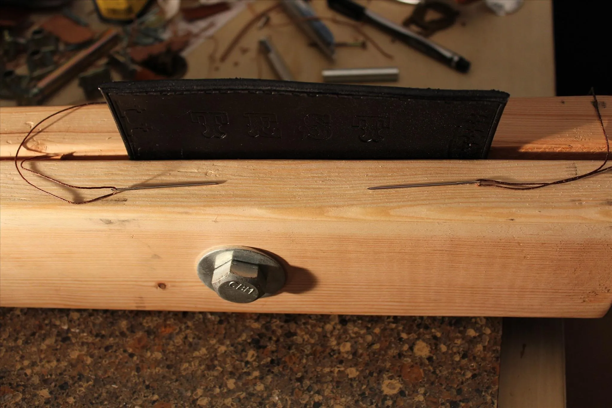 Woodworking tool setup on a workbench.