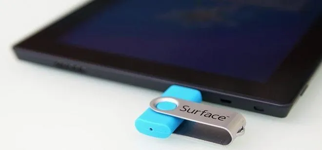 USB flash drive connected to a tablet.