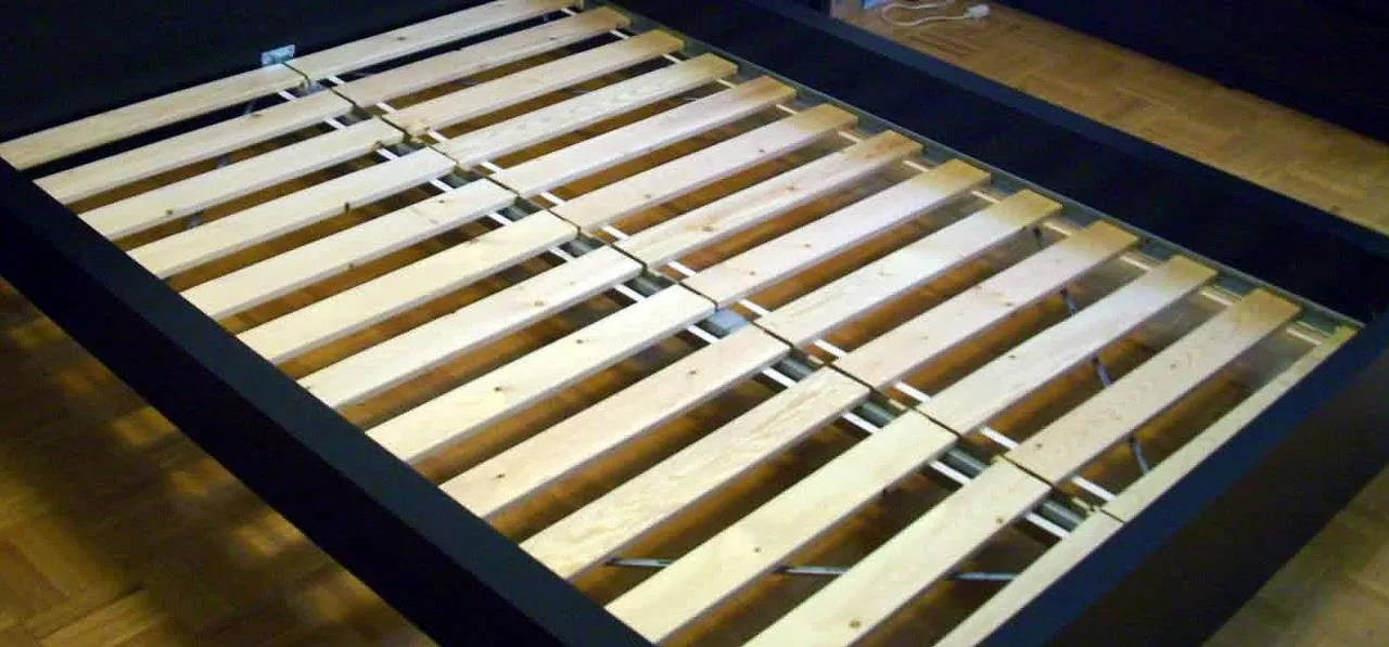 Metal fasteners arranged on a chessboard.