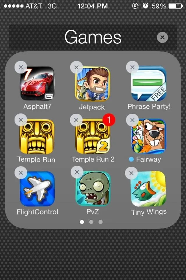 Games folder on a mobile device displaying various app icons.