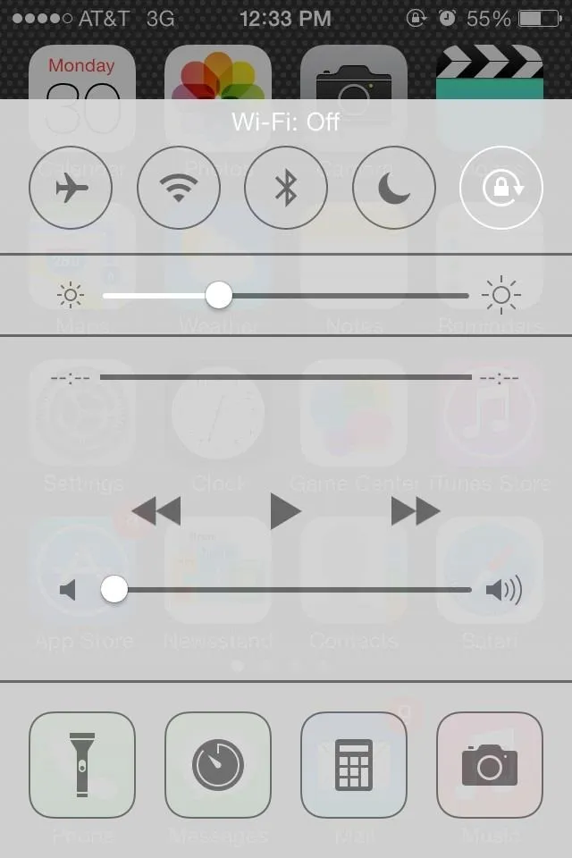 Control panel displaying settings for brightness, volume, and other features on a mobile device.
