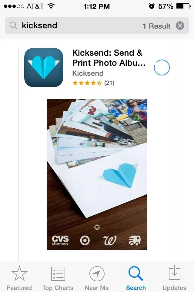 Kickass: Send & Print Photo Album app icon featuring a blue heart design.