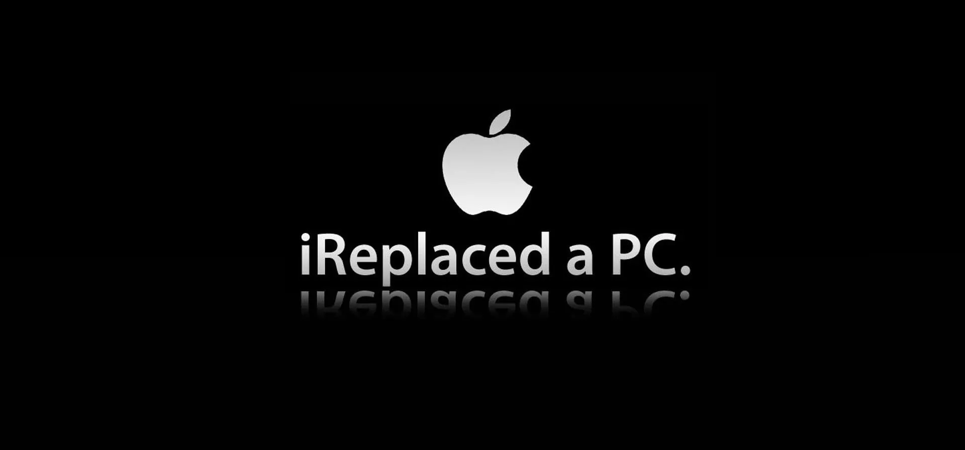 Apple logo with the text "iReplaced a PC" beneath it.