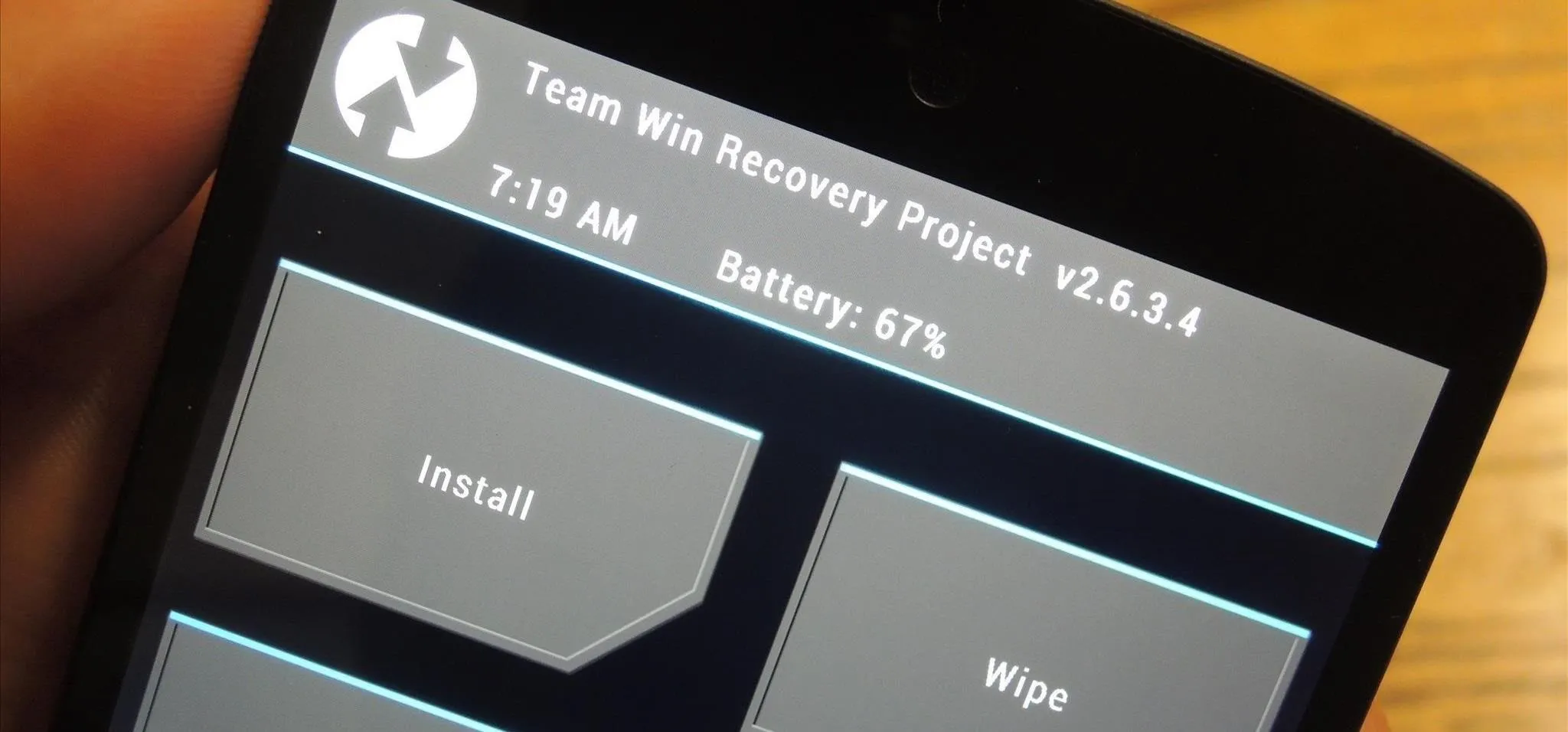 Custom Android recovery interface on a smartphone displaying options for install and wipe.