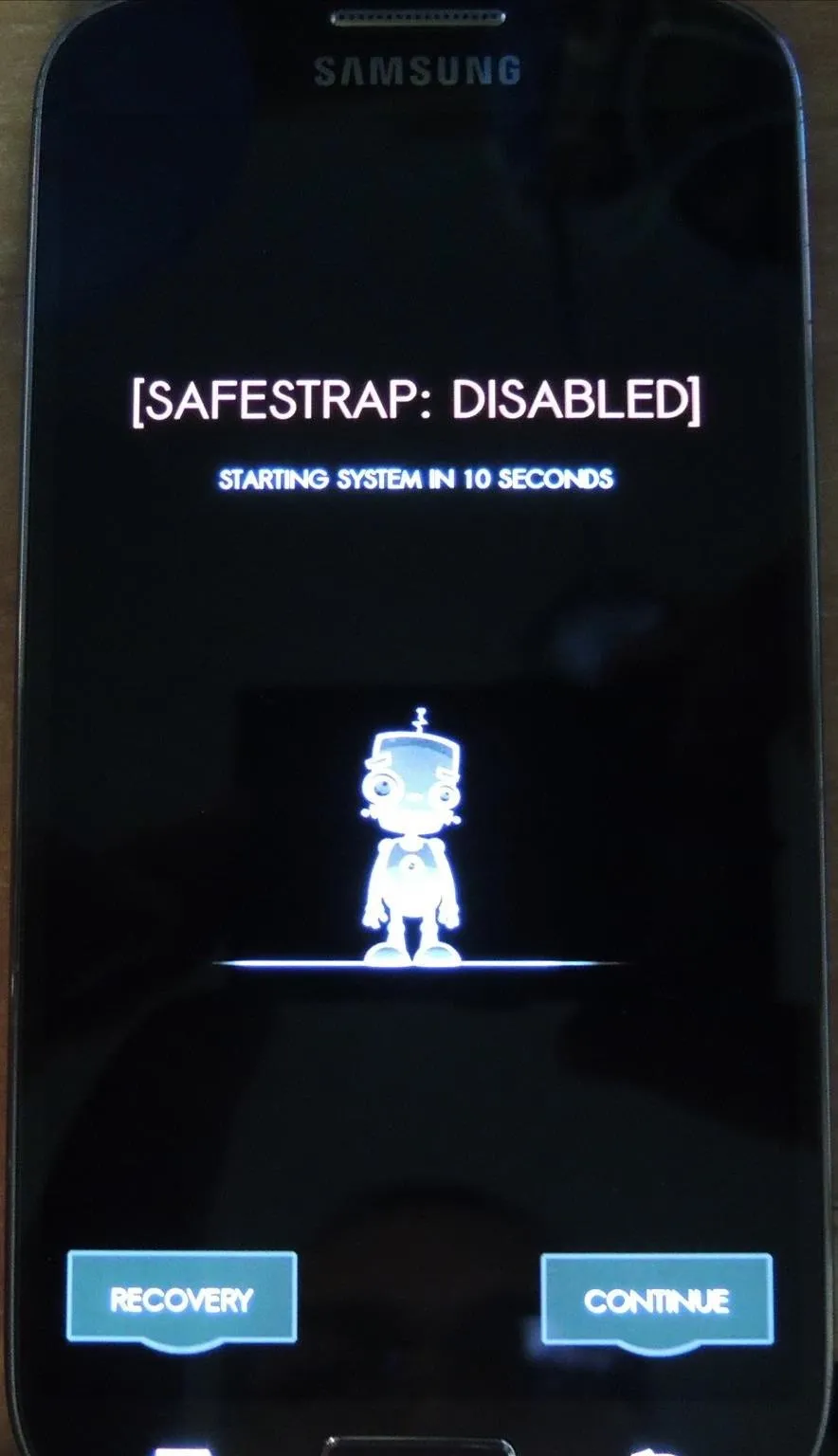 Smartphone screen displaying a notification that Safestrap is disabled, with options to recover or confirm.