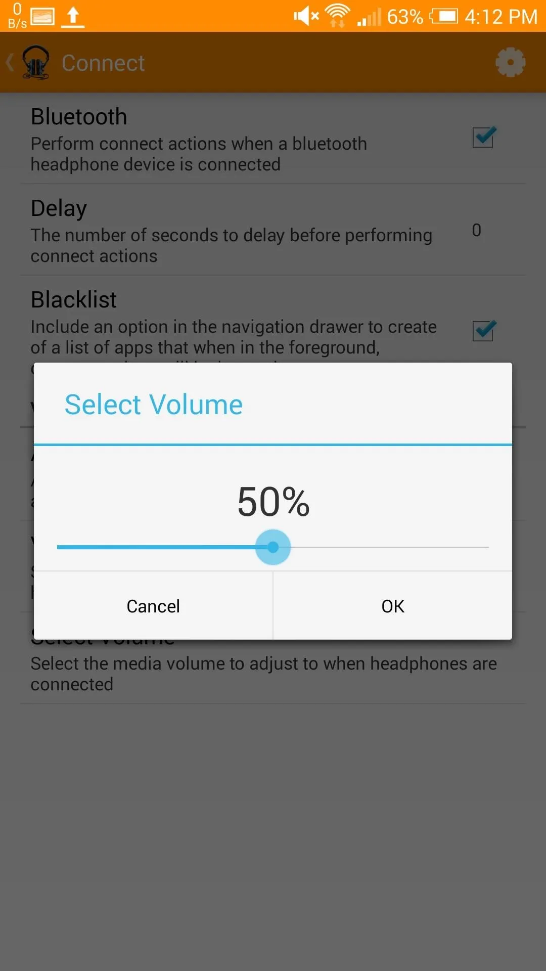 Volume control settings at 50% with options to cancel or confirm.