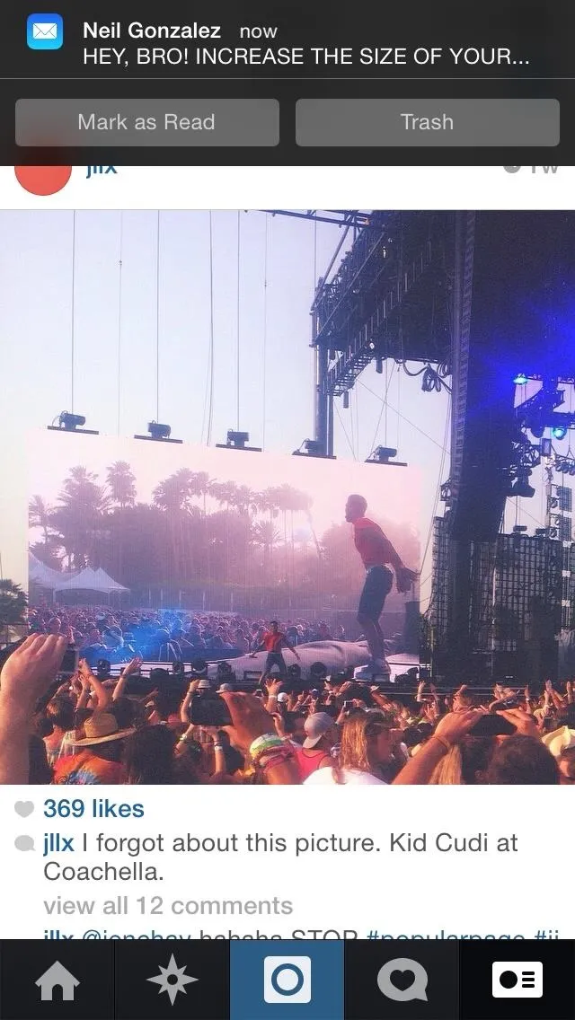 Concert audience with a sunset backdrop.