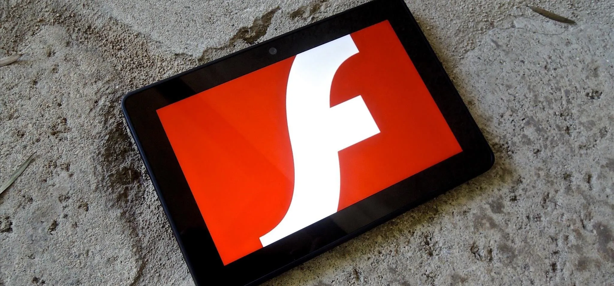 Adobe Flash logo on a tablet screen.