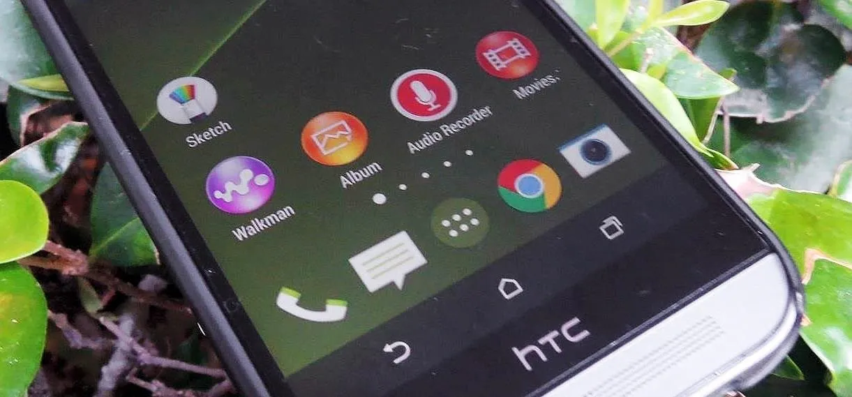 HTC smartphone screen displaying various app icons.