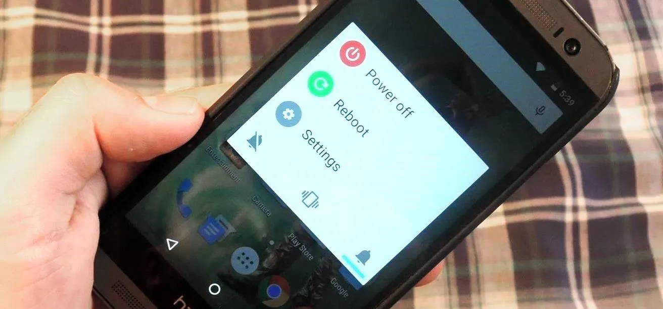 Smartphone displaying options for power off, reboot, and settings.