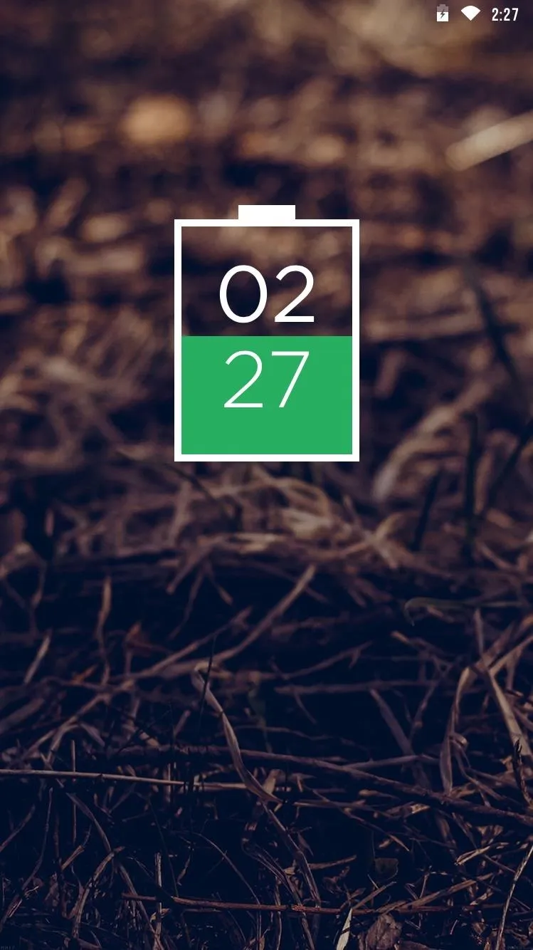 Digital display of a battery percentage and date on a textured background.