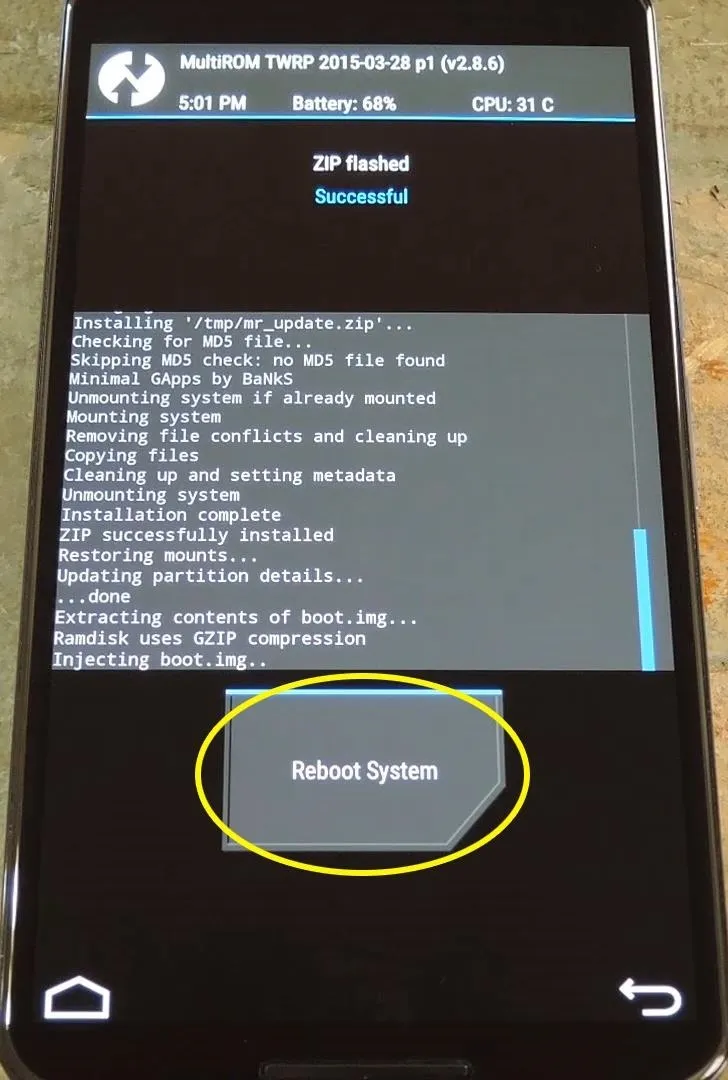 Mobile device displaying a system information screen with a "Reboot System" button highlighted.