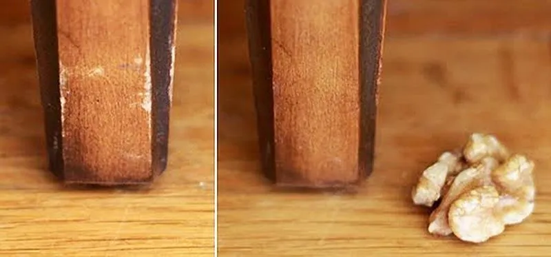 Close-up of wood surface with a wood block and a piece of walnut.