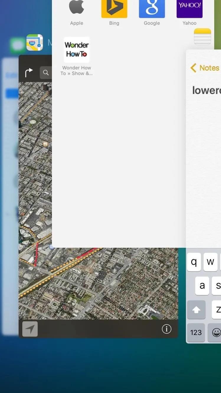 Map interface with a multitasking view on a mobile device.