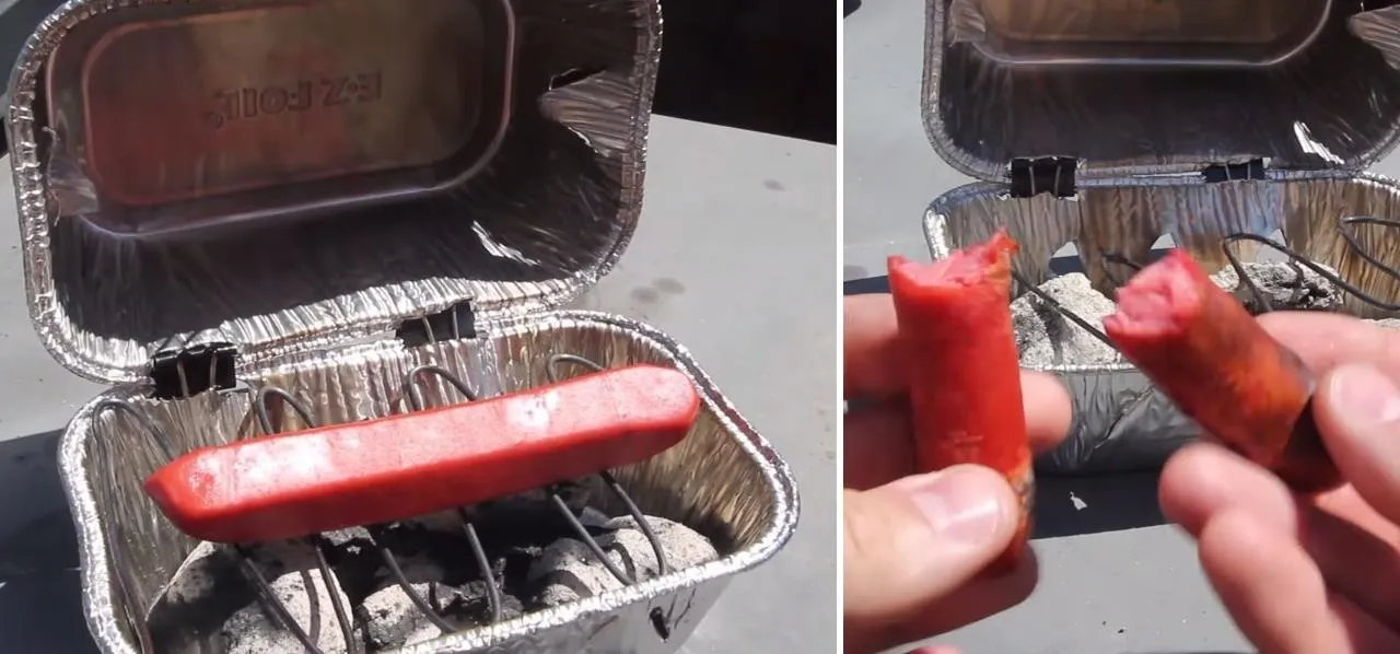 Grilled hot dogs in a portable grill.