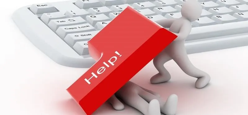 Person lifting a large red "Help!" key above another figure on a keyboard.