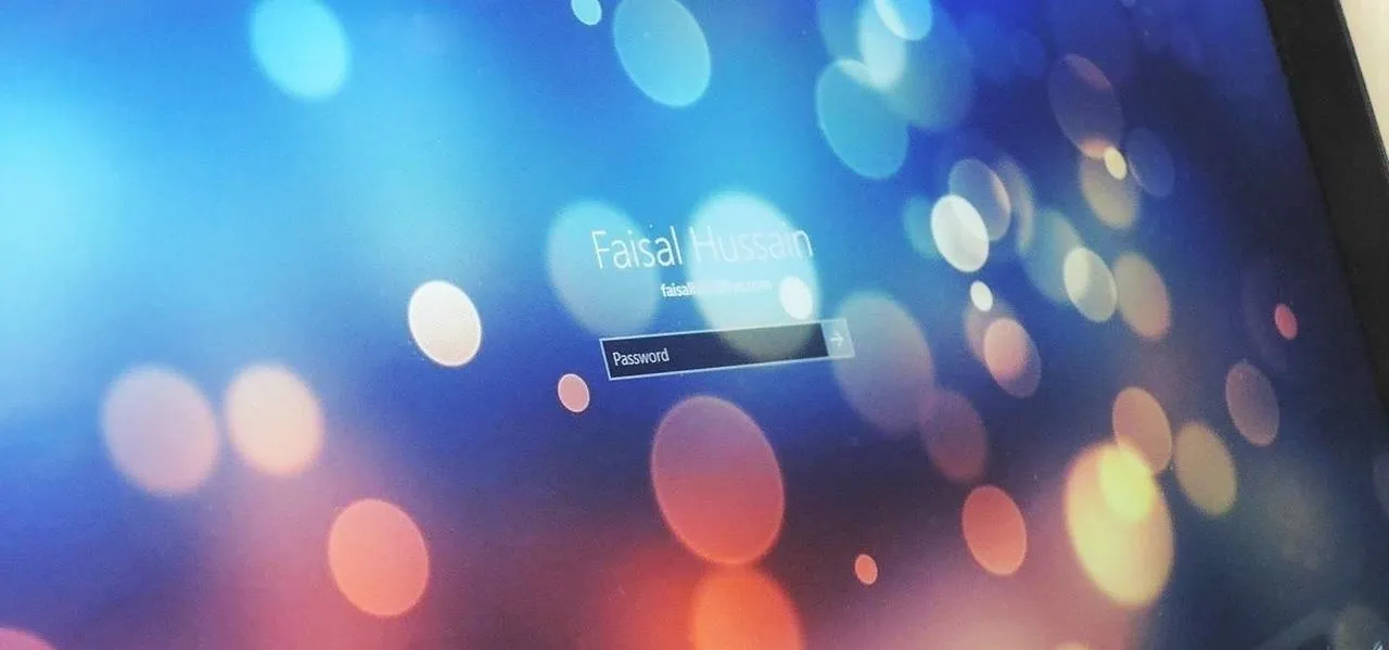 Colorful abstract background with blurred lights and a login interface.