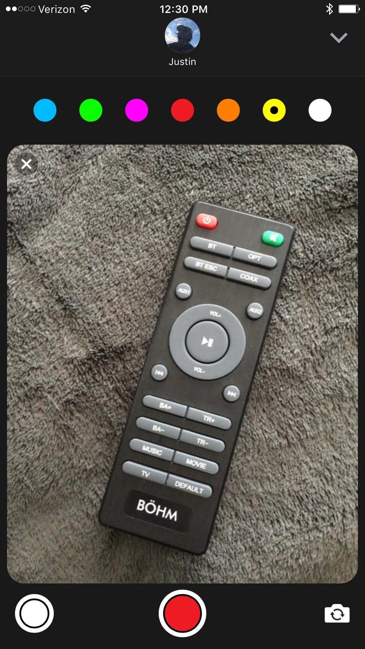 Remote control on a textured surface.