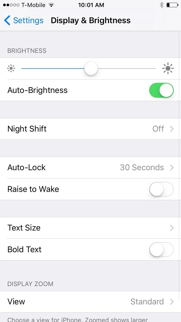 Settings menu displaying brightness options on a mobile device.