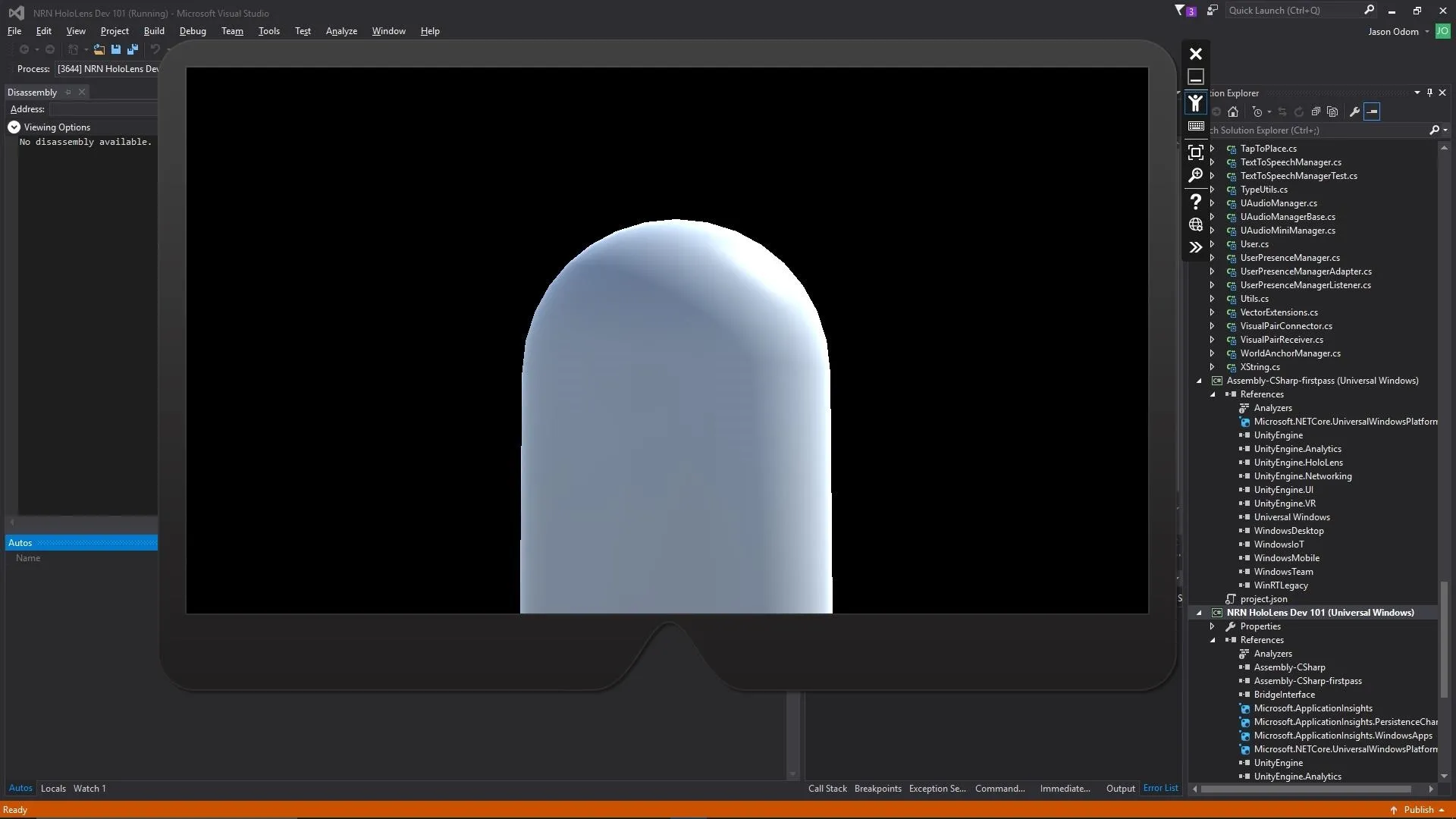 3D model of a glossy cylindrical shape on a black background.