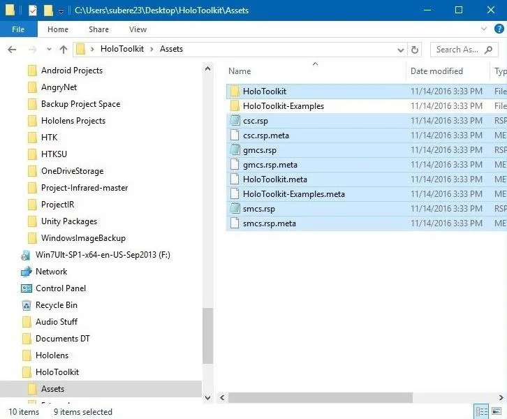 File directory showing various folders and files related to web development projects.