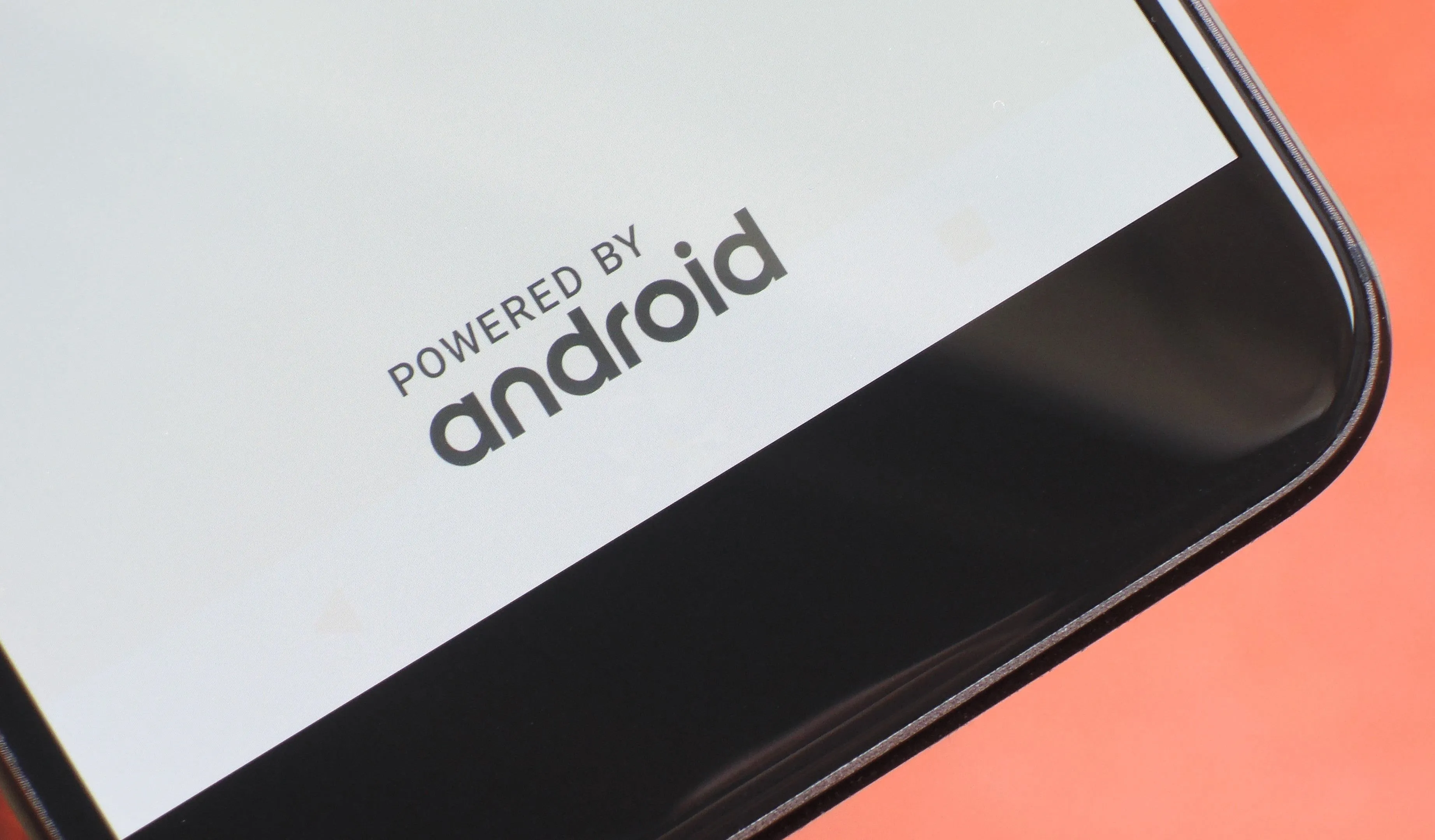 Powered by Android logo on a smartphone screen.