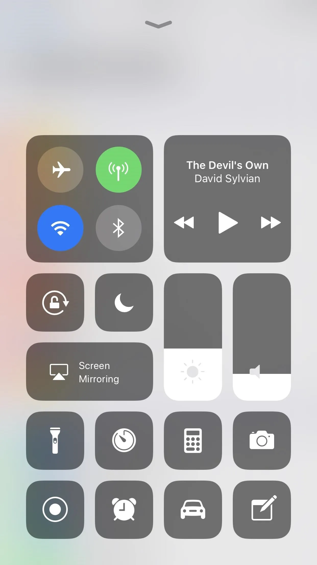 Control Center interface on a smartphone displaying various toggle options.