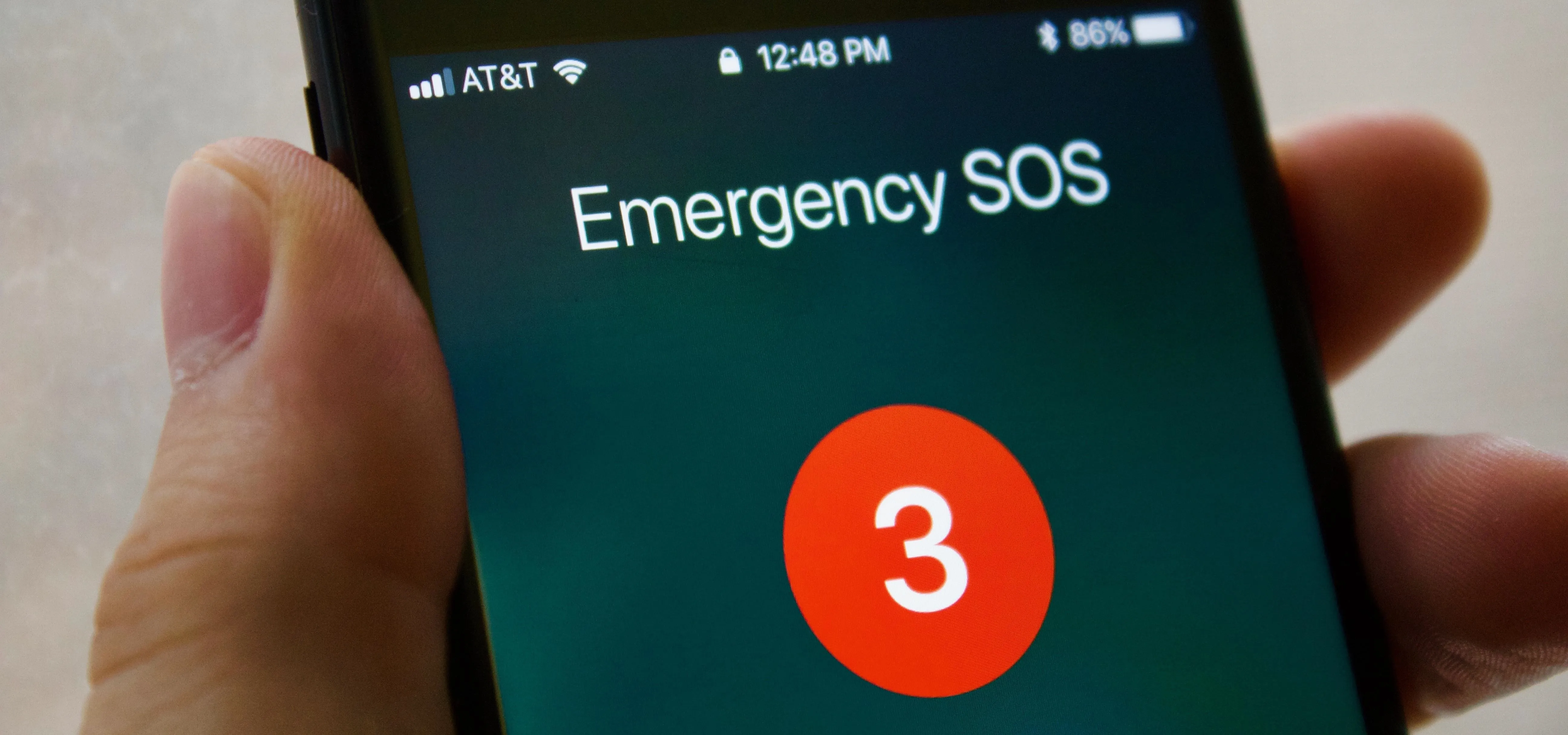 Emergency SOS feature on a smartphone displaying countdown.