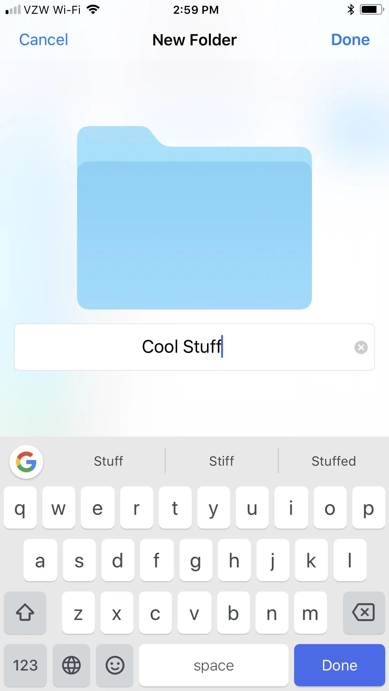 Creating a new folder named "Cool Stuff" on a smartphone.