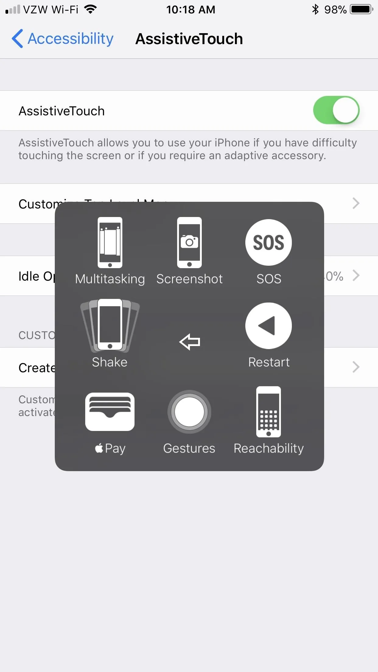 iPhone accessibility settings menu displaying AssistiveTouch options.